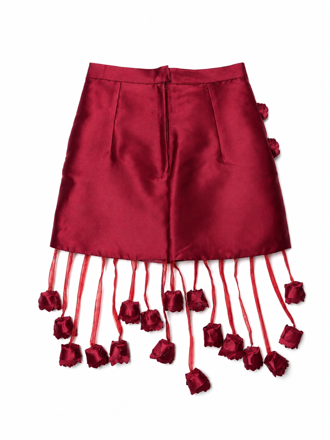 Alternate back flat lay of the ÌGBÀANÌ Crimson Bloom Skirt and cascading flowers