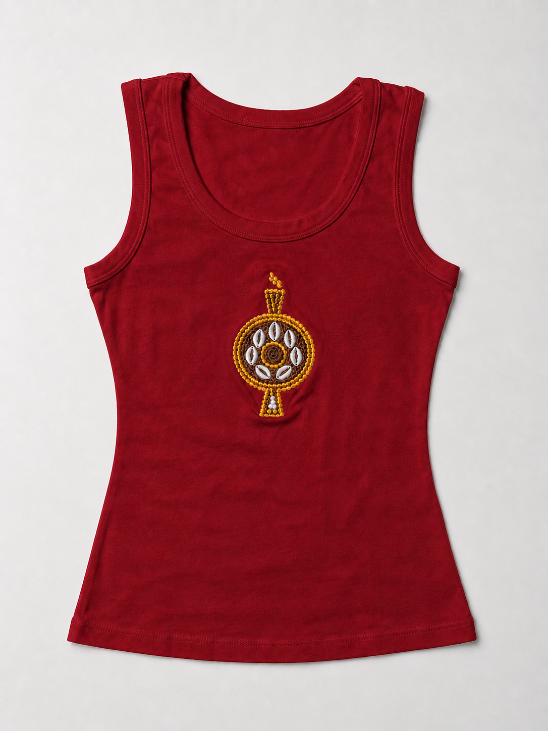 Front view of The ÌGBÀANÌ Tank in deep Crimson Pulse red with embellished chest motif