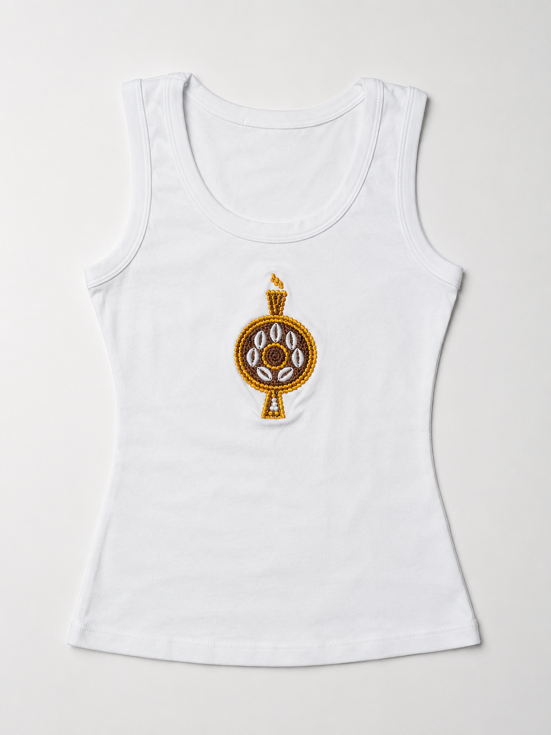 Front view of The ÌGBÀANÌ Tank in Ivory Light white with embellished chest motif