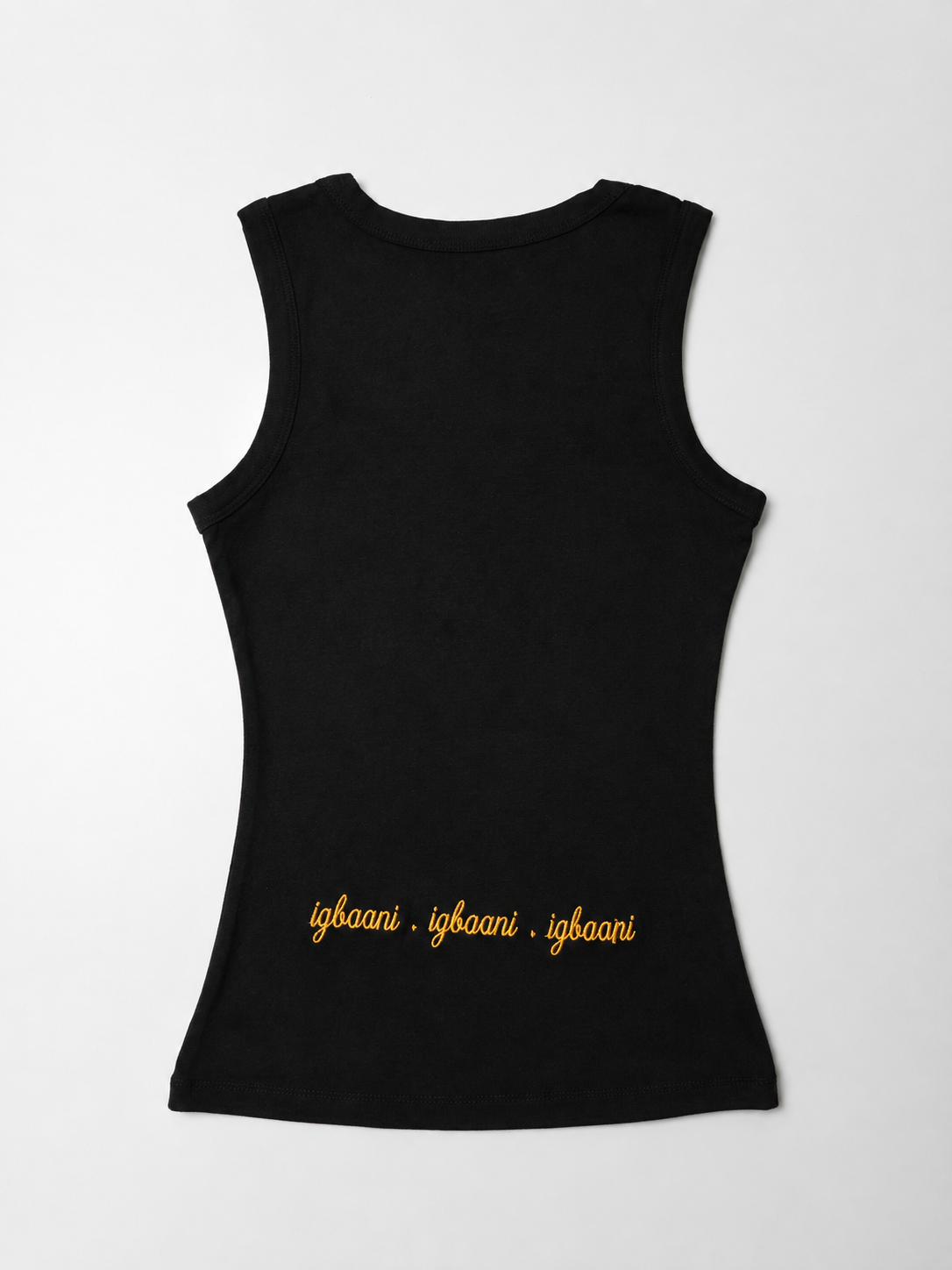 Back view of The ÌGBÀANÌ Tank in Midnight black with embroidered hem signature