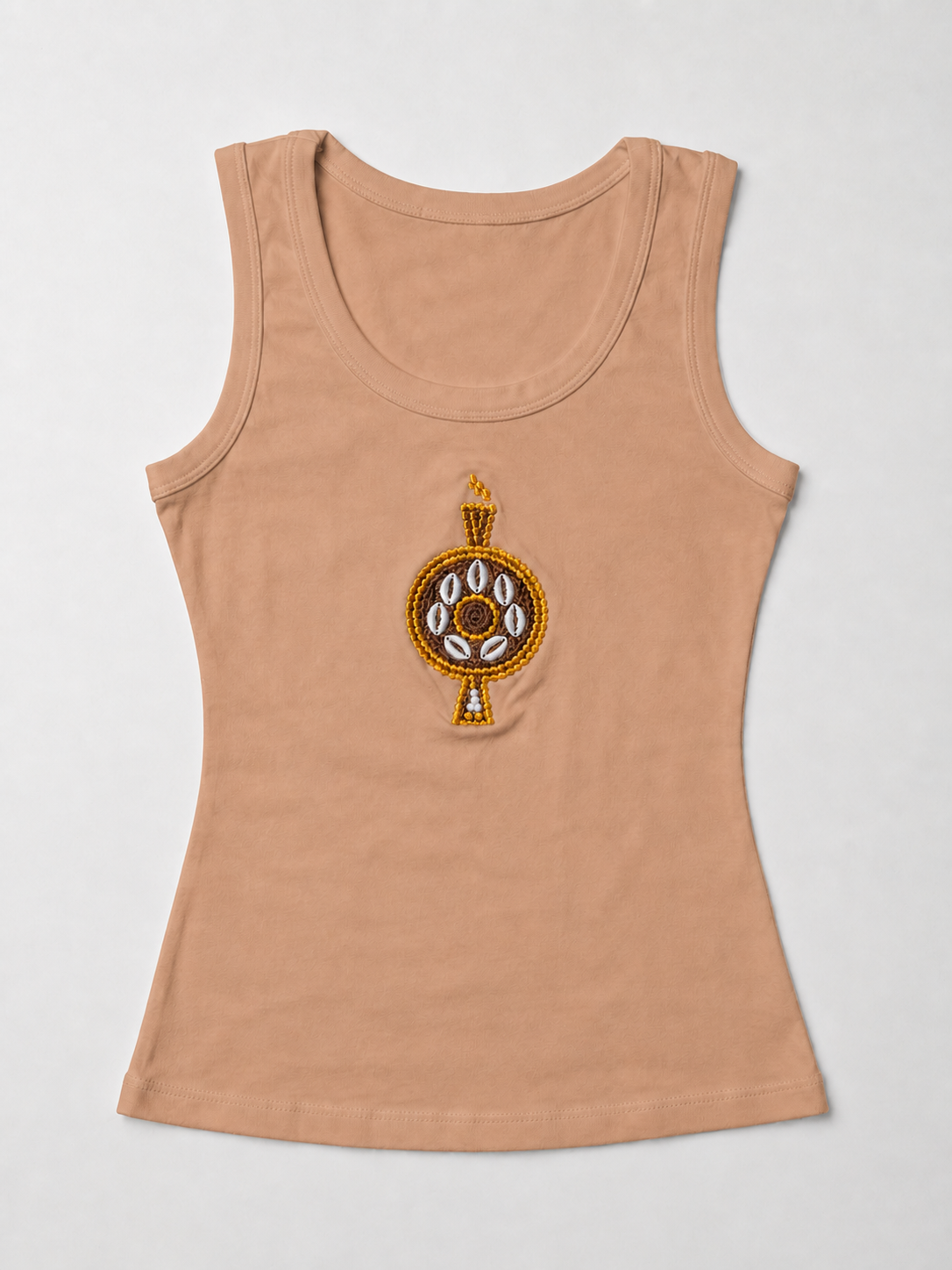 Front view of The ÌGBÀANÌ Tank in Peach Glow, Peach Nude, with embellished chest motif