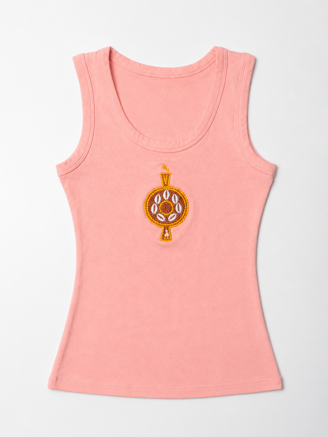 Front view of The ÌGBÀANÌ Tank in Petal Pink with embellished chest motif