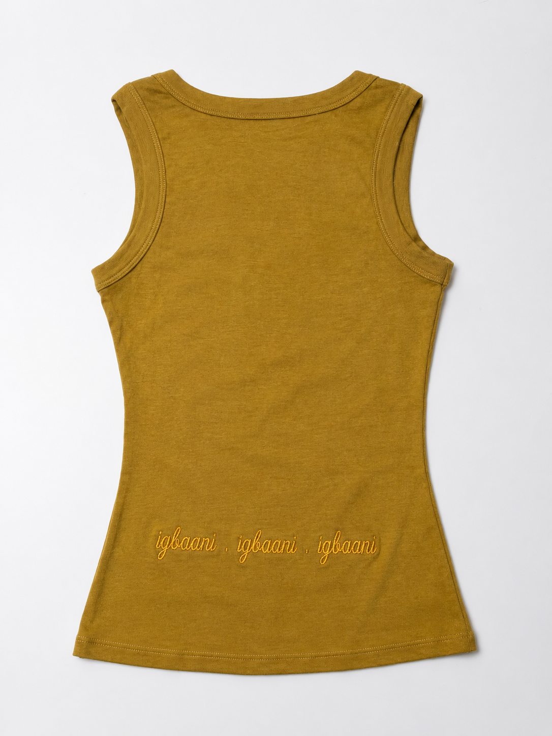 Back view of The ÌGBÀANÌ Tank in Saffron Gold mustard with embroidered hem signature