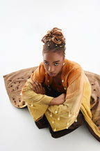 Editorial styling 3 of the ÌGBÀANÌ Aureline Kimono, Shellwork Trousers and Ember Clay Tank