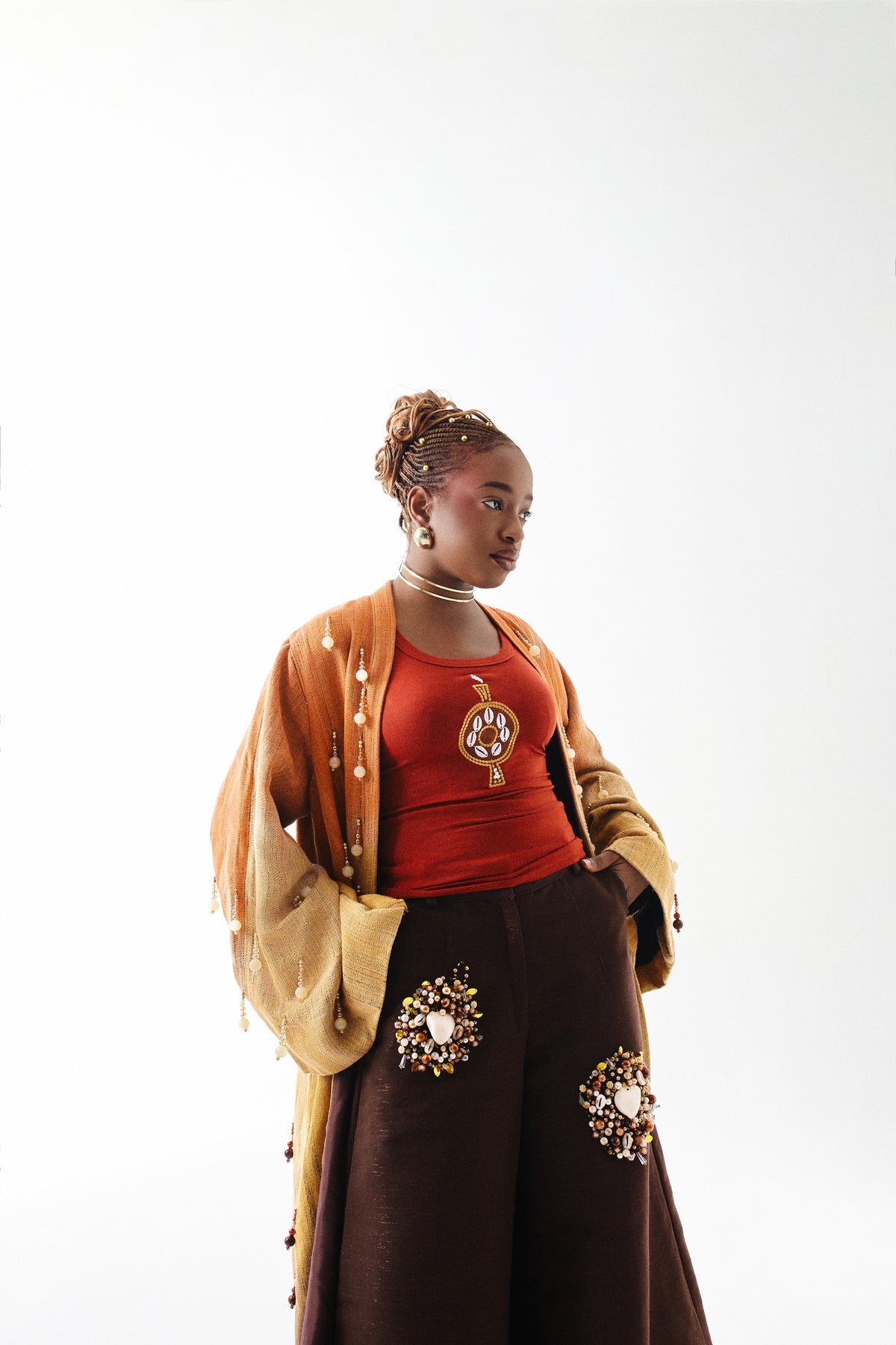 Editorial styling 4 of the ÌGBÀANÌ Aureline Kimono, Shellwork Trousers and Ember Clay Tank