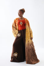 Editorial styling 5 of the ÌGBÀANÌ Aureline Kimono, Shellwork Trousers and Ember Clay Tank