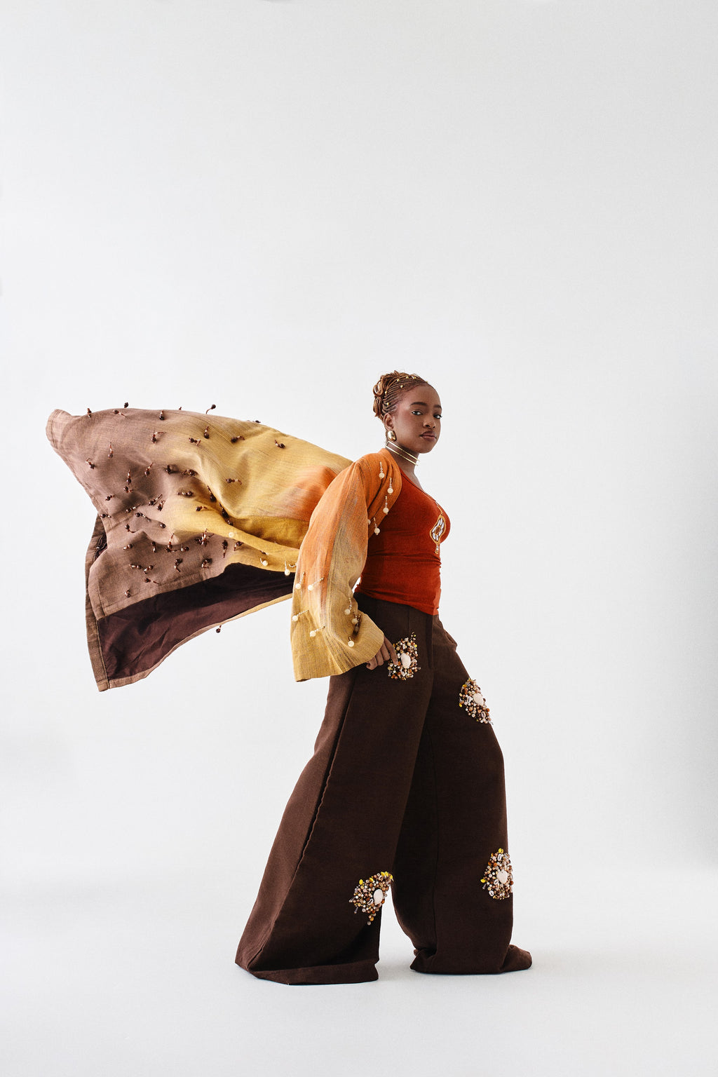 Editorial styling 7 of the ÌGBÀANÌ Aureline Kimono, Shellwork Trousers and Ember Clay Tank